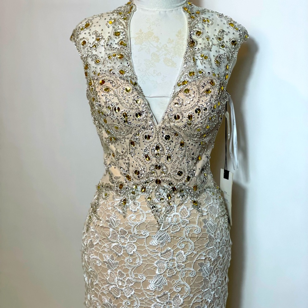 New evening Gown, never been used. With tags attached.